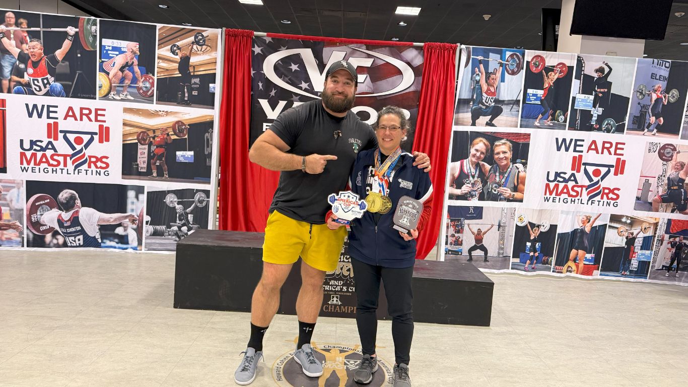 tom_and_michelle_howard_cohen_weightlifting.jpg